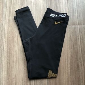 Women’s Black Nike Pro Leggings Gold Writing